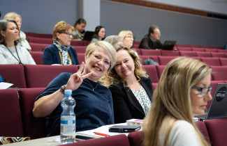 People in auditorium.