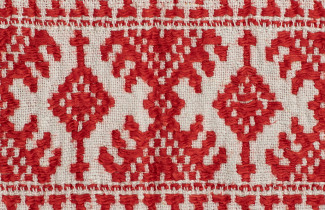 Karjalainen kirjailutyö.