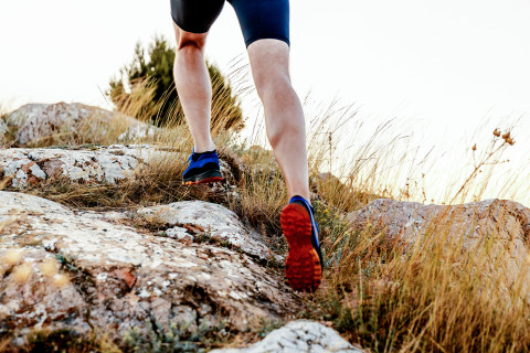 Athlete running uphill