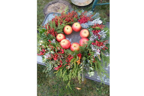 Thank you world -valokuvanäyttelyn seppelekuva.