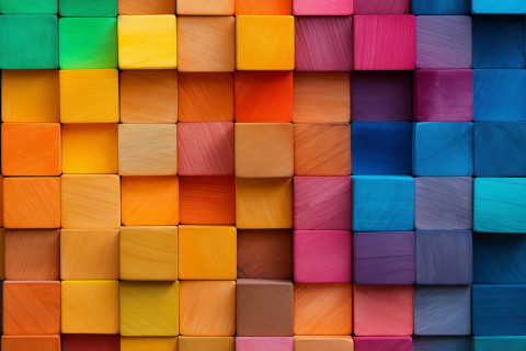 Seinämä värikkäistä rakennuspalikoista.