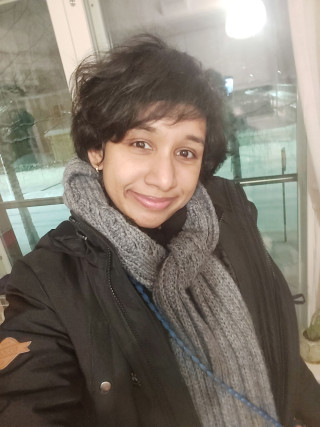 Student smiling.