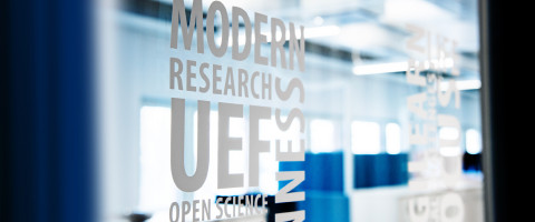 Text stickers on glass wall.