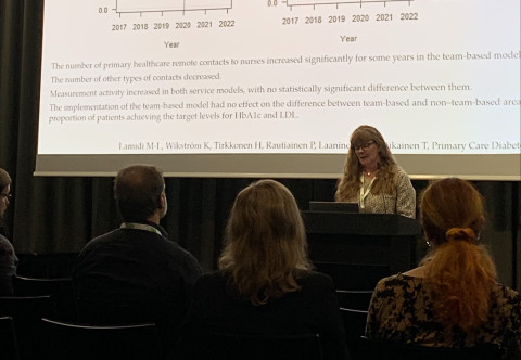 Tiina Laatikainen giving a presentation