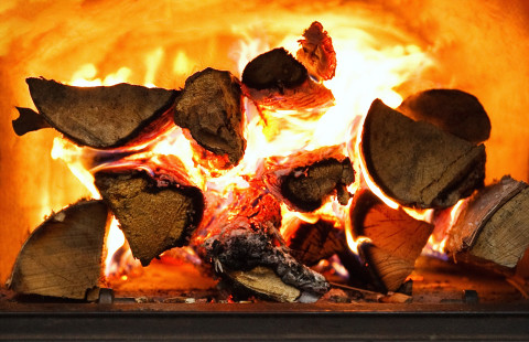 Wood burning in a stove.