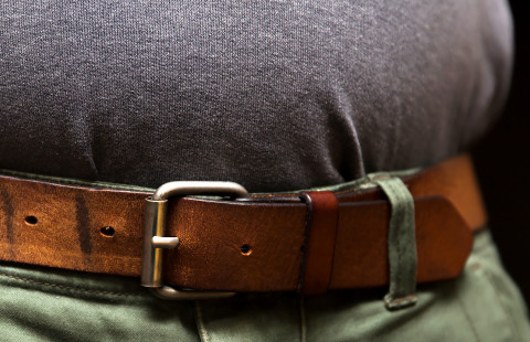 Obese person&#039;s waist.