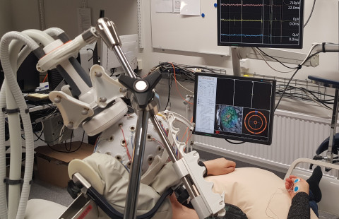 Transcranial magnetic stimulation of an EPM1-patient. 