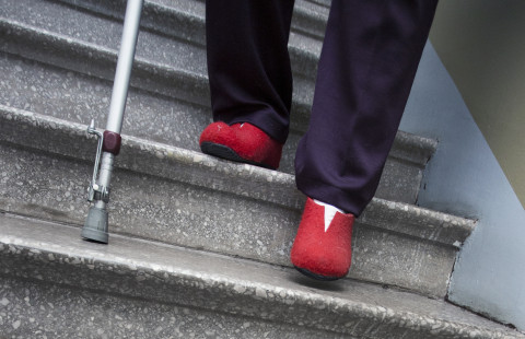 Old person going down the stairs