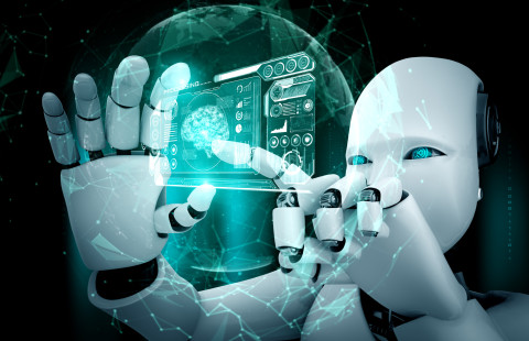 Robotti koskettaa hologramminäyttöä.