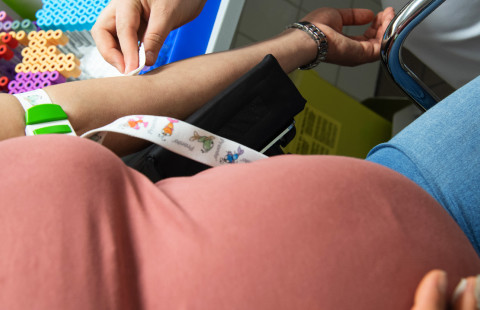Pregnant woman having a blood test.