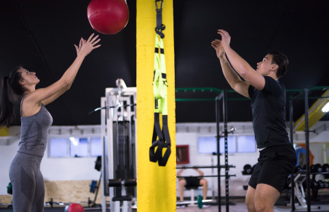 Athletes playing ball game.