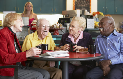 Group of elderly people having coffee.