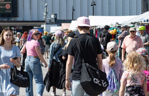 People on a market square.