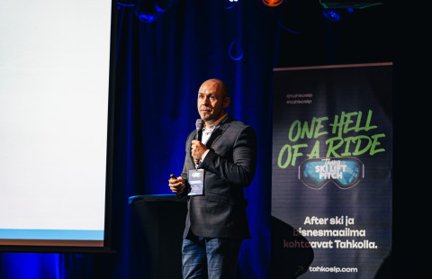 man pitching on stage