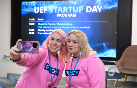 AliceAI co-founders Anne-Mari Pitkänen and Iida Pitkänen take a photo together at UEF Startup Day 2025.