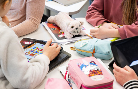  Students doing assignments.