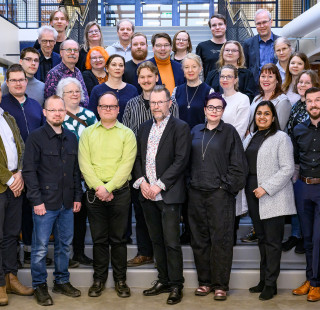 The University Collegium in a group photo 2026.