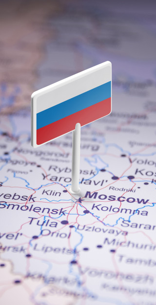 Map presenting Russian border and a Russian flag pointing of Moscow